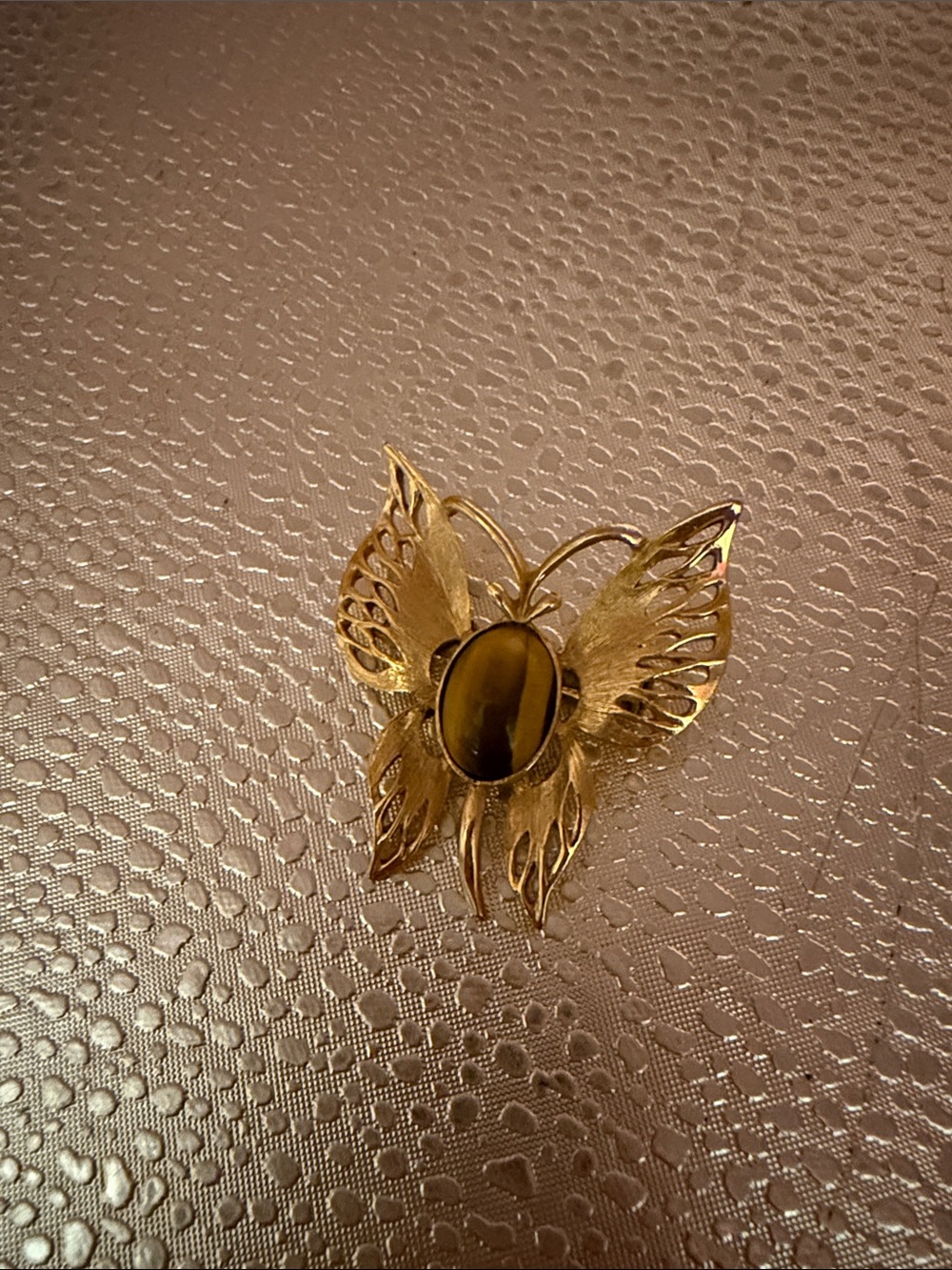 Vintage Wells 14 K gold filled butterfly brooch with an oval cabochon stone
